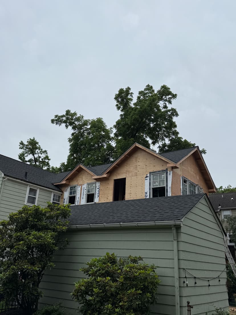 House renovation with new roofing in progress